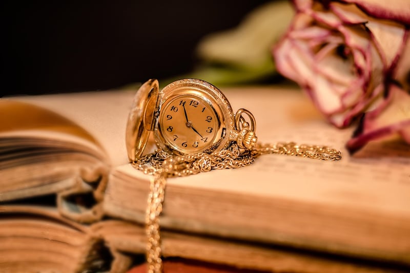 Time travel concept with clock and light trails